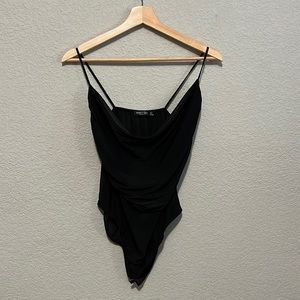 Nasty gal ruffled bodysuit. Only worn once.